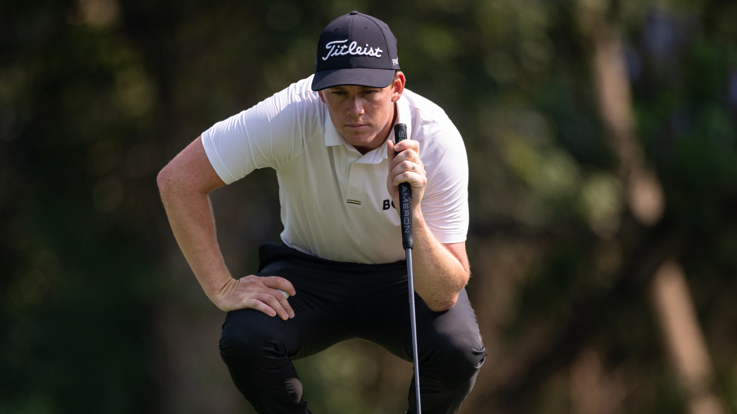 Daniel Hillier lines up a putt