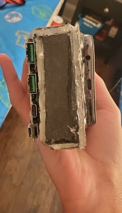 The added ports of a modded 30,000mAh Galaxy A32 5G.