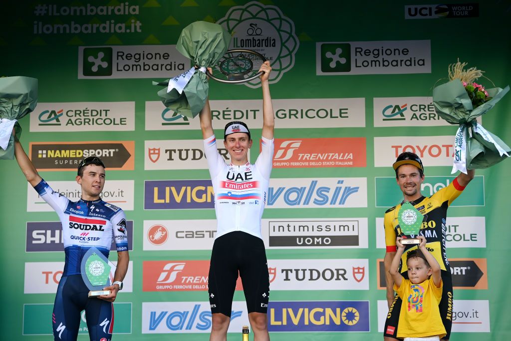 Il Lombardia podium (l-r): second place Andrea Bagioli (Soudal QuickStep), winner Tadej Pogačar (UAE Team Emirates) and third place Primož Roglič (Jumbo-Visma)