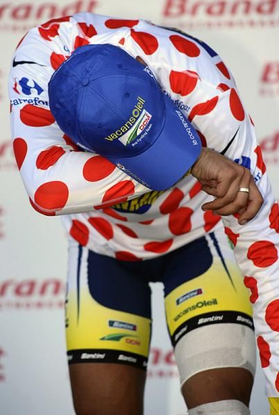 KOM leader Johnny Hoogerland had a harrowing day during stage nine and is overcome with emotion on the podium.
