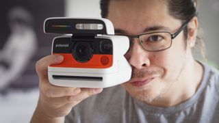 Photographer James Artaius using a Polaroid Flip camera