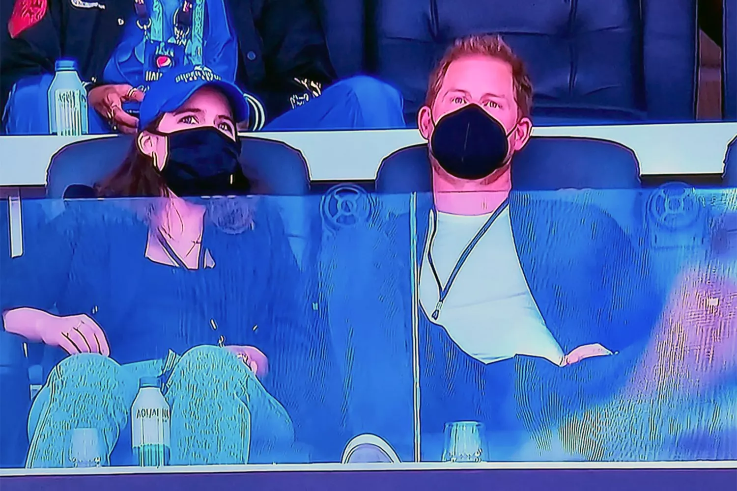 Prince Harry and Princess Eugenie sitting in the stands at the Super Bowl 2022
