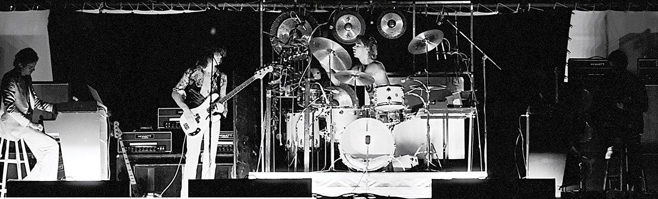 King Crimson onstage in Central Park, New York, in 1974 – their last show before recording Red, and the final show to feature David Cross.