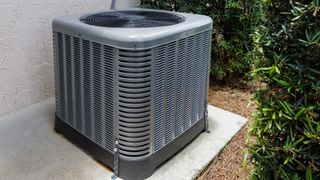 air conditioning unit next to house 