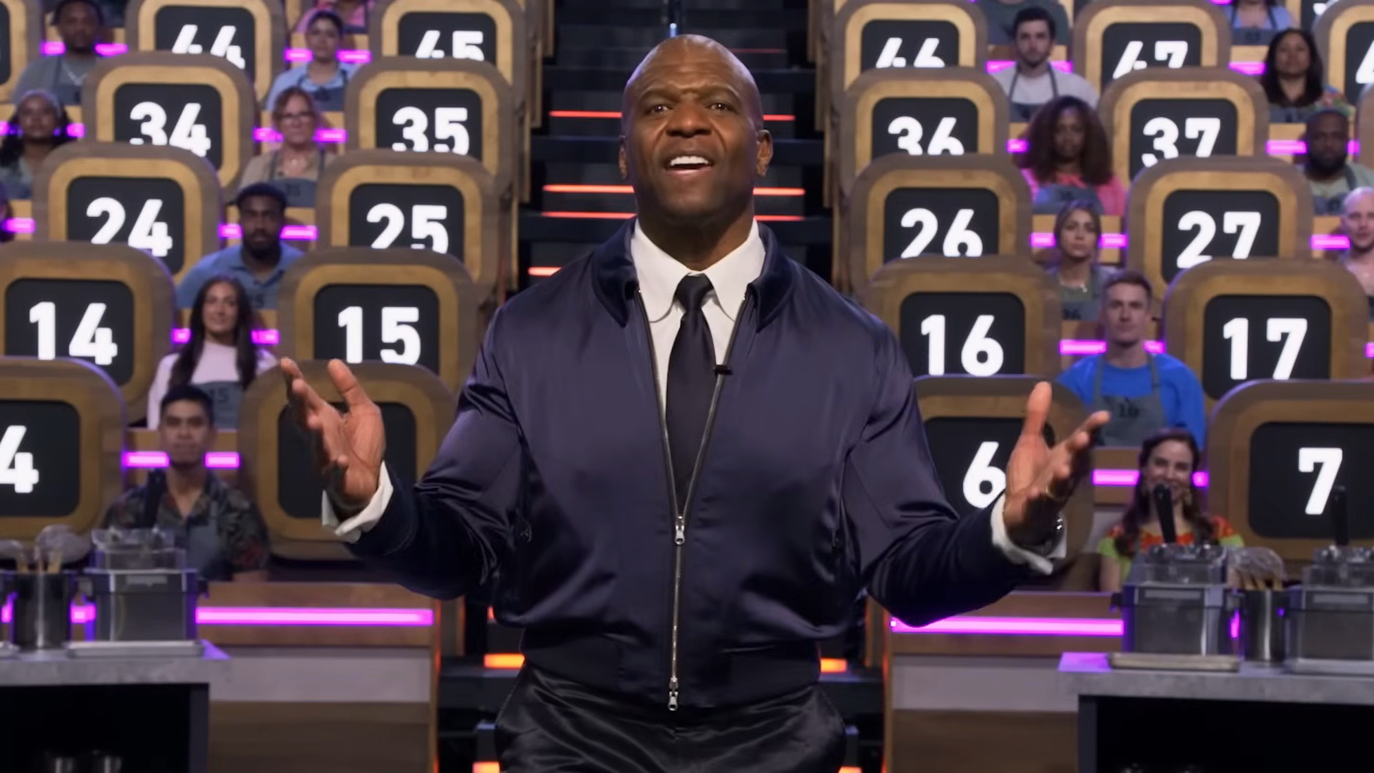 Host Terry Crews is shown on 100 Cooks.