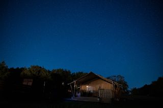 Nikon Z8 example image of the stars above a cabin