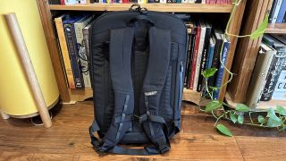 Mous Extreme Commuter backpack on a wooden floor in a living room
