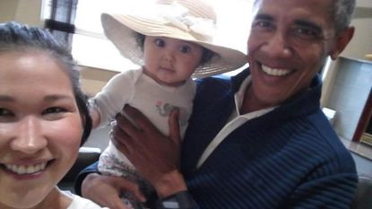 Former President Obama meets an Alaskan mom and baby
