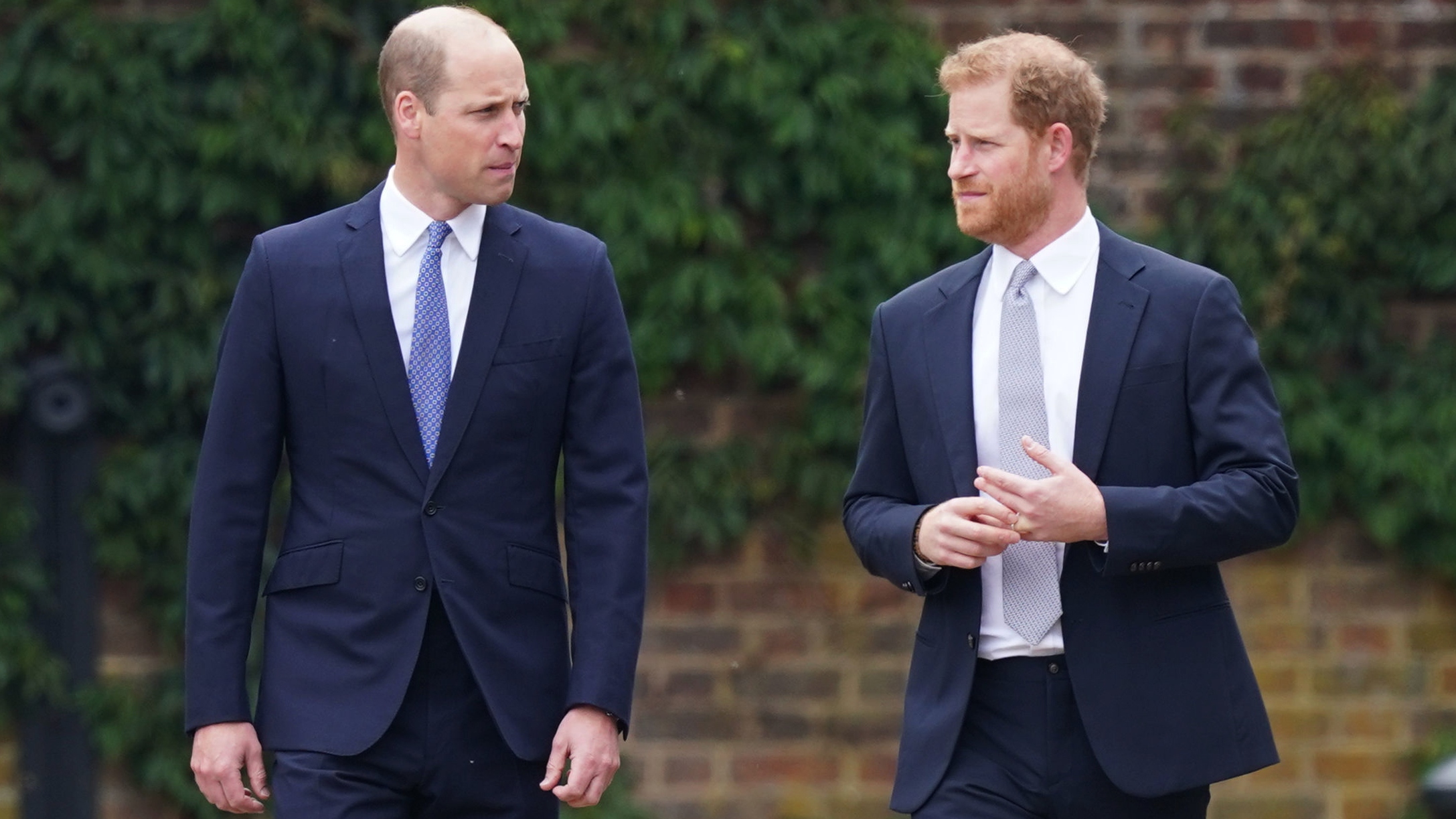 Prince William (left) and Prince Harry, Duke of Sussex arrive for the unveiling of a statue they commissioned of their mother Diana, Princess of Wales