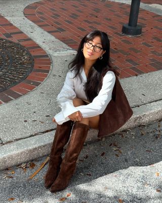 Winter boot trends: @jeannine.roxas wears brown suede boots