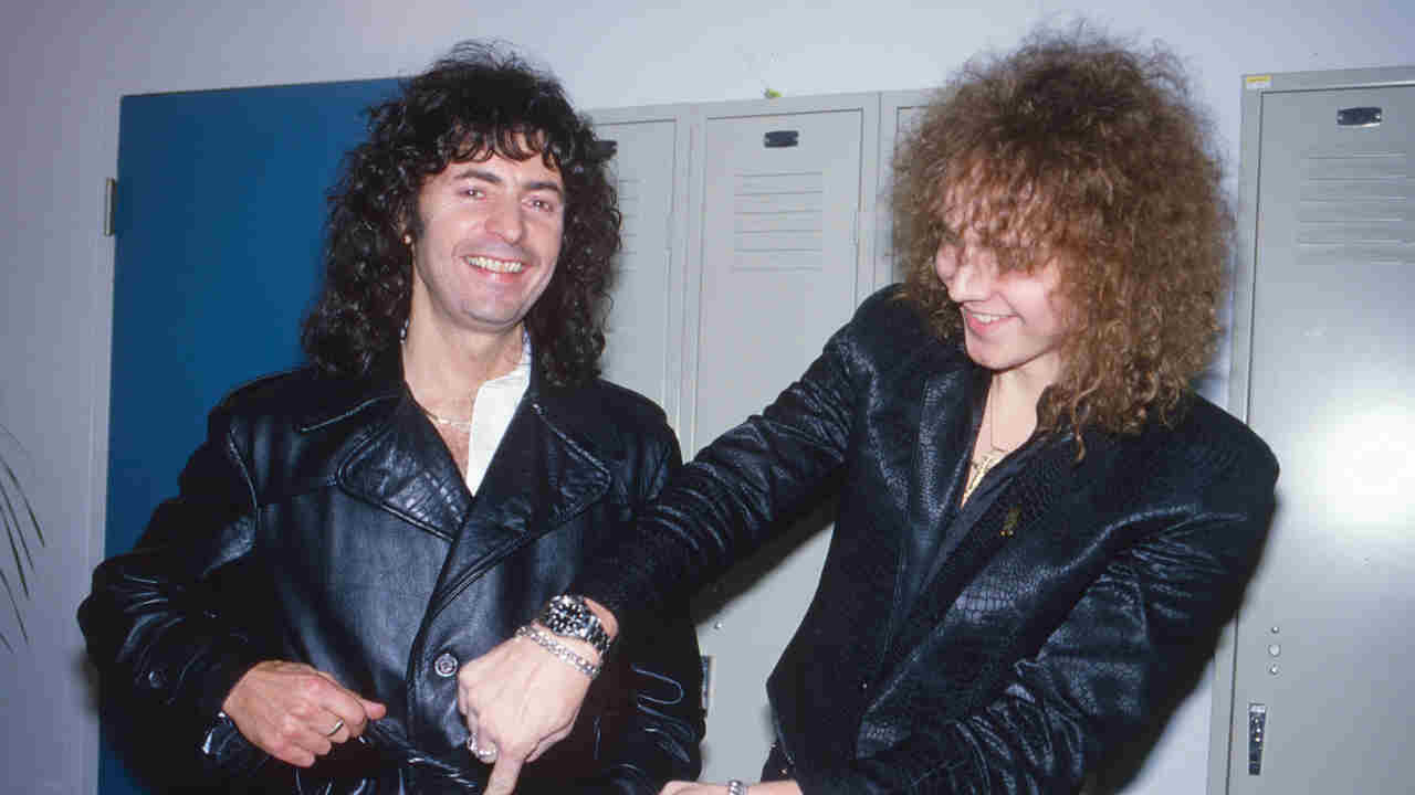 Yngwie Malmsteen posing for a photograph