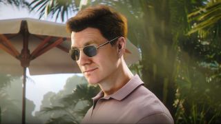 Young James Bond smiles assuredly while wearing sunglasses in 007 First Light.