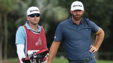 Caddie Austin Johnson with brother Dustin Johnson on the course
