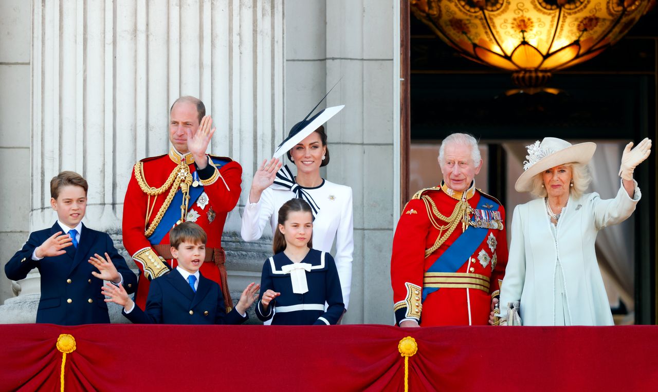 Prince George, Prince Louis, Prince William, Kate Middleton, Princess Charlotte, King Charles and Queen Camilla waving on the balcony of Buckingham Palace at Trooping the Colour 2024