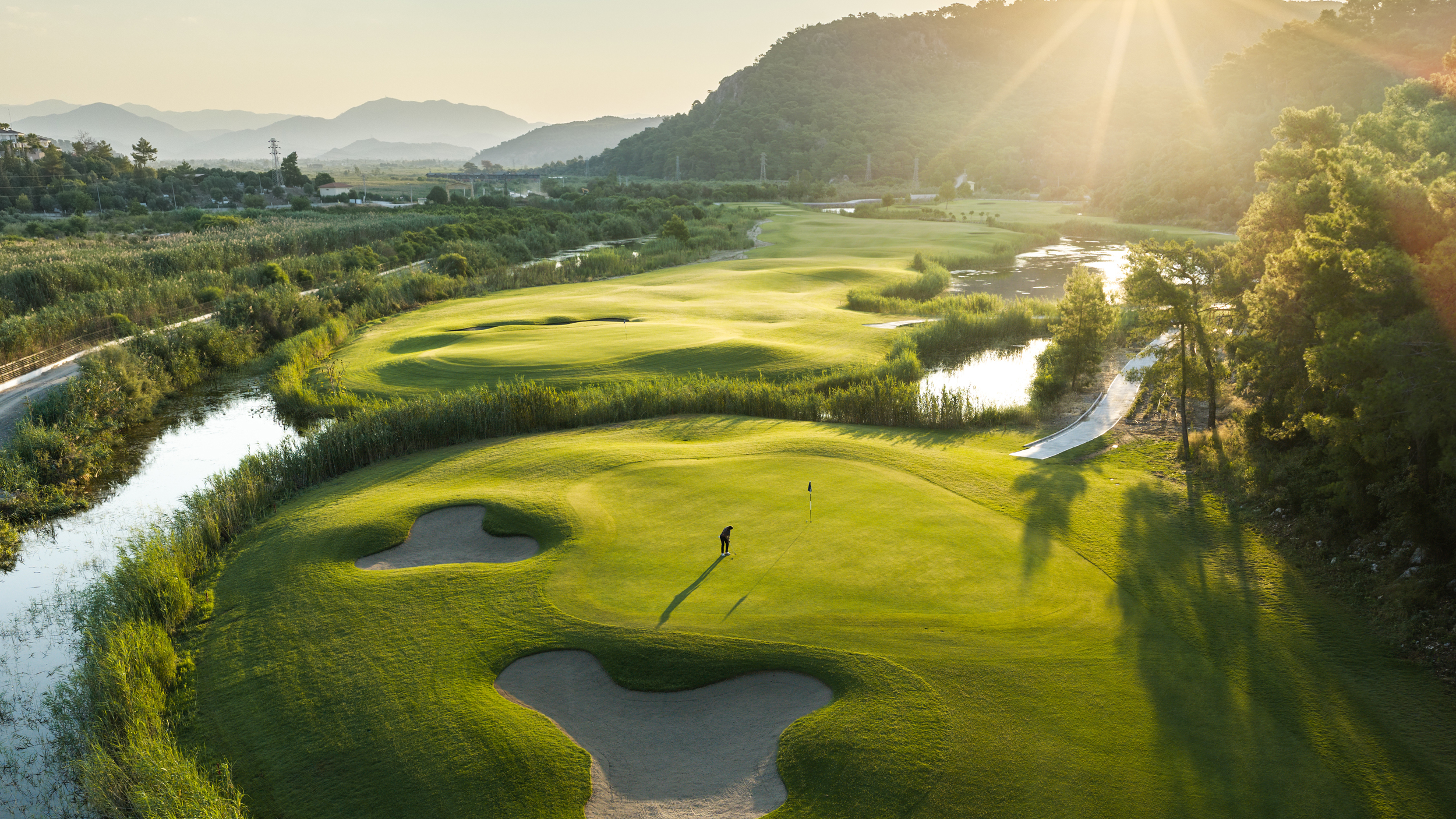 A hole at Hilton Dalaman with the mountains in the background