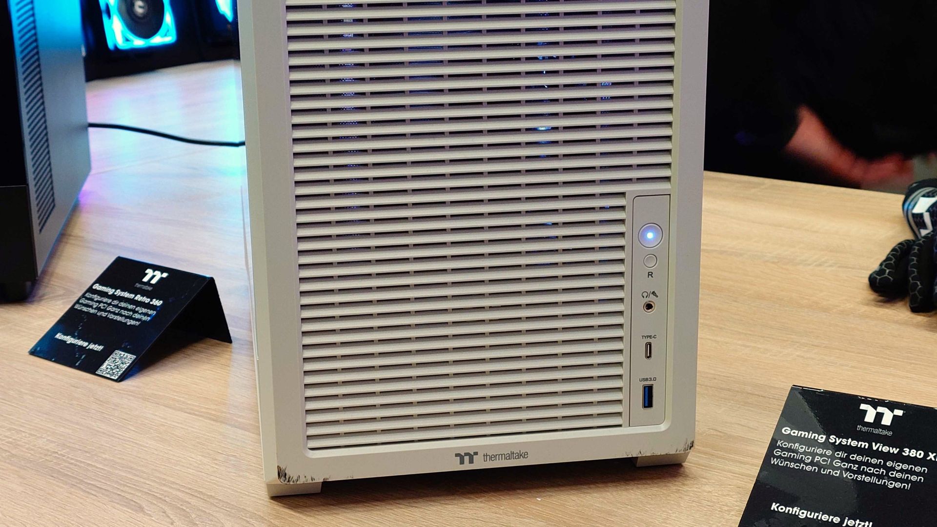 Photos of the Thermaltake Retro 360 PC case showing different angles. 