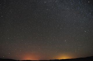 Night sky photographer Marian Murdoch captured this view of a Leonid meteor over the high desert of Ridgecrest, Calif., during the peak of the Leonid meteor shower of 2012 on Nov. 17 and 18.