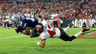 Amari Cooper #19 of the Dallas Cowboys catches a touchdown pass against Ross Cockrell #43 of the Tampa Bay Buccaneers during the third quarter at Raymond James Stadium on Sept. 9, 2021 in Tampa, Florida.