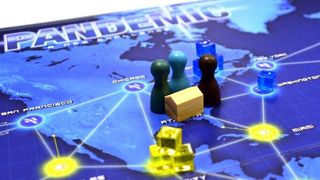 Pieces on the board of the board game Pandemic