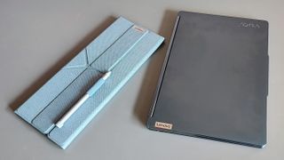 The Lenovo Yoga Book 9i on a desk