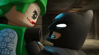 LEGO Batman Legacy of the Dark Knight screenshot showing batman grabbing joker
