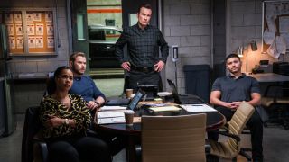 FBI: Most Wanted cast sitting at table cbs