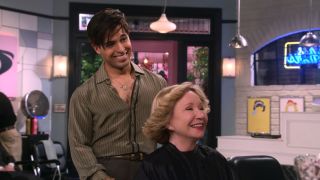 Fez as stylist cutting Kitty's hair in That '90s Show