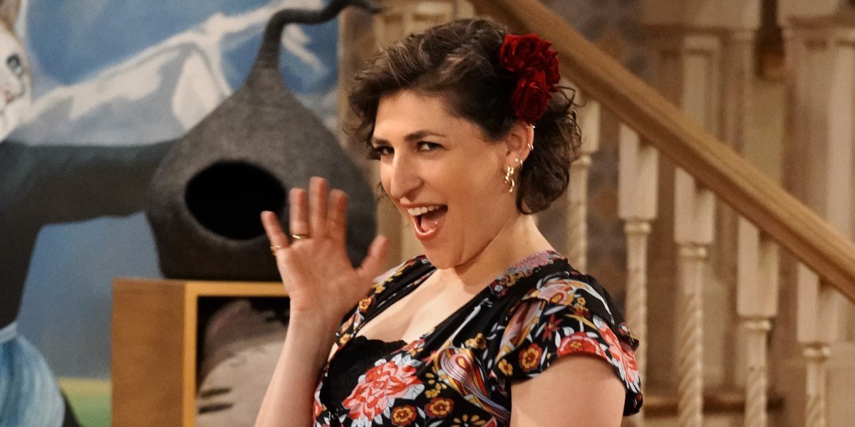 mayim bialik waving seductively to the camera on call me kat