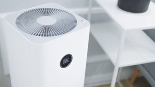 White portable air conditioner in living room