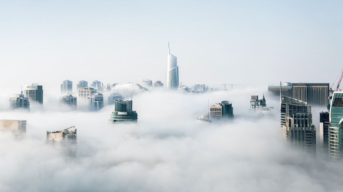 Cloud POS symbolized by view of cityscape buried in clouds