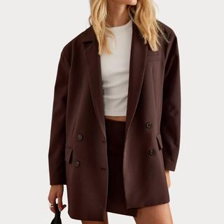 Flat lay image of a brown blazer