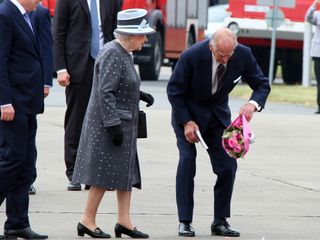 The time Philip picked up something the Queen had dropped