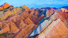 View of China's Rainbow Mountains with differently colored bands of sandstone.