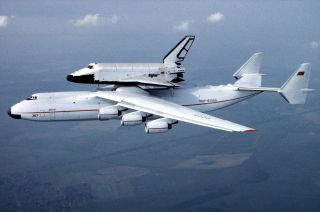 The Antonov AN-225 "Mriya" transports the Soviet-era Buran space shuttle orbiter piggyback, as the aircraft was originally designed to do.