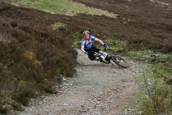 A rider goes down on stage 2