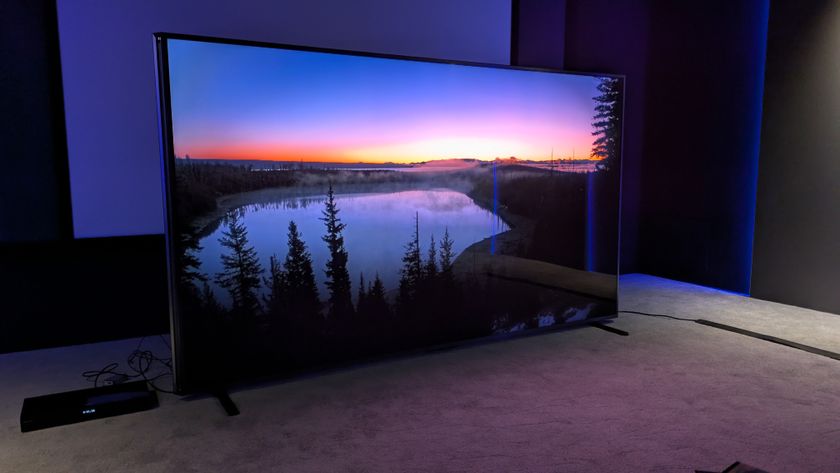 Hisense 110UXN listing image with sunset on screen 