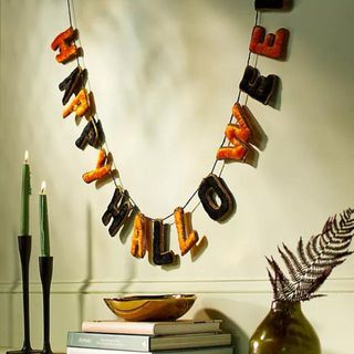 A black and orange halloween banner from Anthropologie