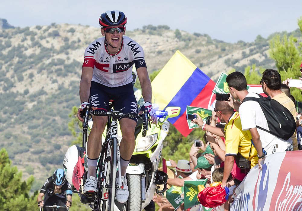Iam's Swiss cyclist Mathias Frank crosses the finish line to win the 17th stage of the 71st edition of 'La Vuelta'