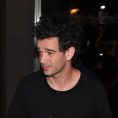 Taylor Swift passes crowds and paparazzi with rumored boyfriend Matty Healy of the 1975