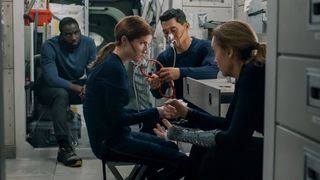 From left, Shamier Anderson, Anna Kendrick, Daniel Dae Kim and Toni Collette in "Stowaway" on Netflix.