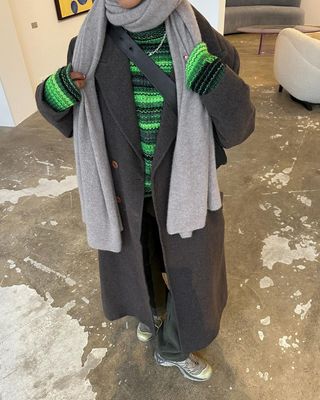 Green jumper with grey coat and scarf