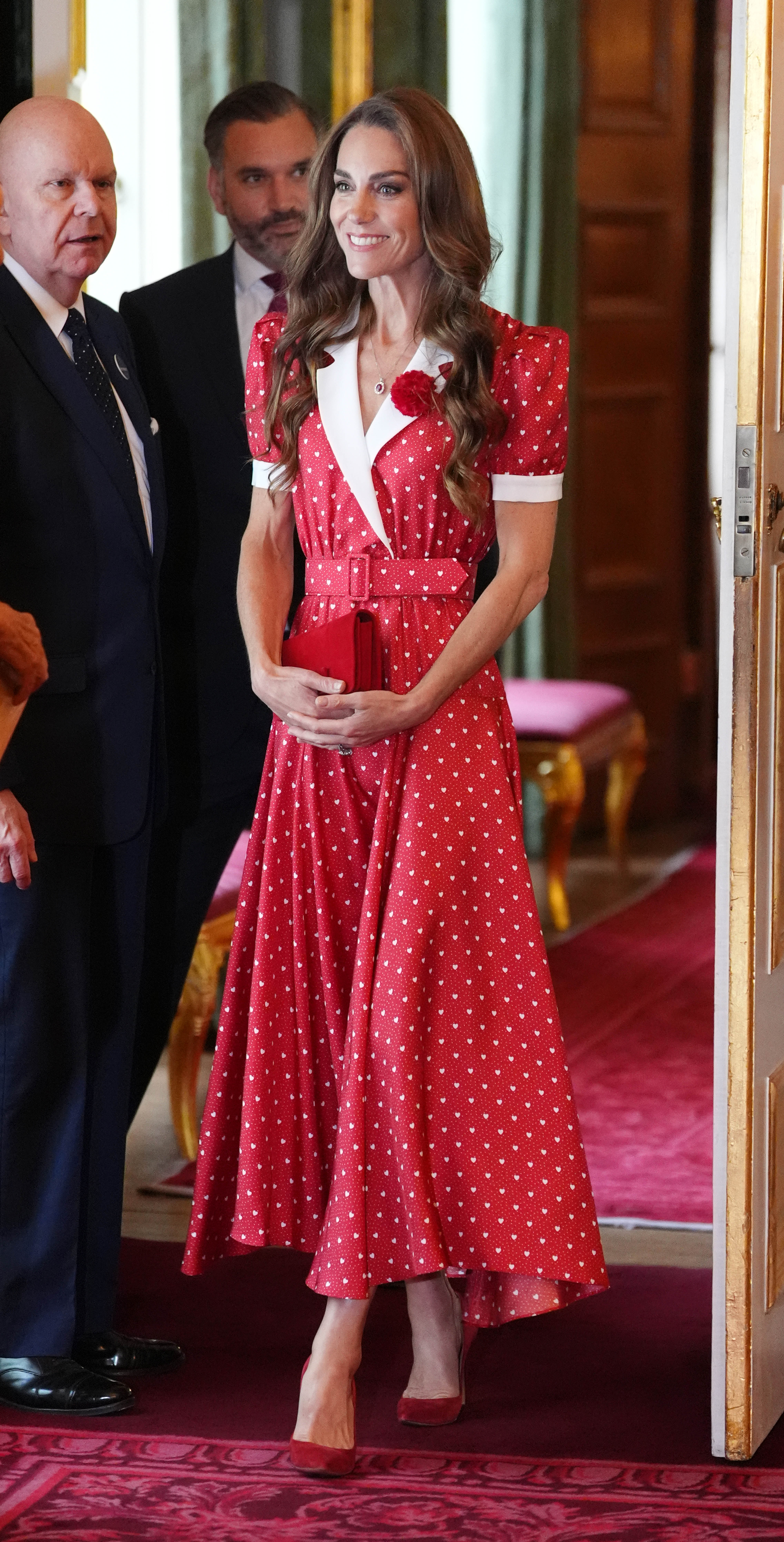 Princess Kate wearing a red polka dot dress