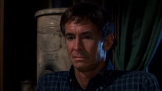 Norman Bates in kitchen with mother in Psycho II