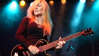 Lita Ford performs at the 7th annual Scott Medlock-Robby Krieger Invitational & All-Star Concert benefiting St. Jude held at Moorpark Country Club on September 22, 2014 in Moorpark, California.