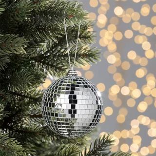 silver disco baubles on a tree