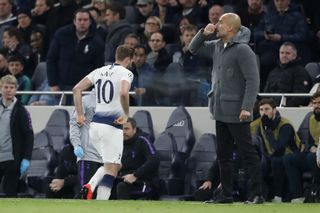 Tottenham's Harry Kane leaves the pitch after picking up an injury against Manchester City in the Champions League