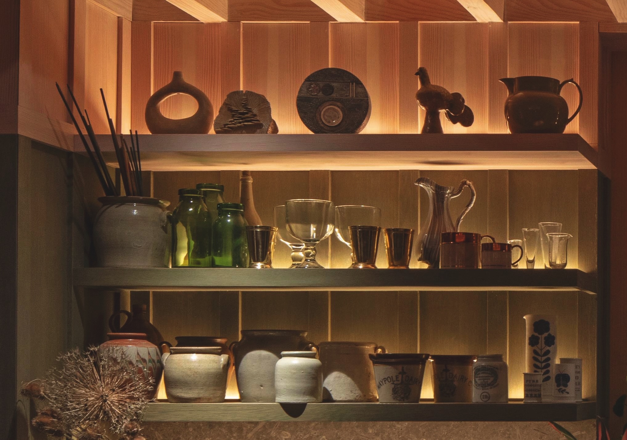 Close up of the shelves, showing the strip lighting