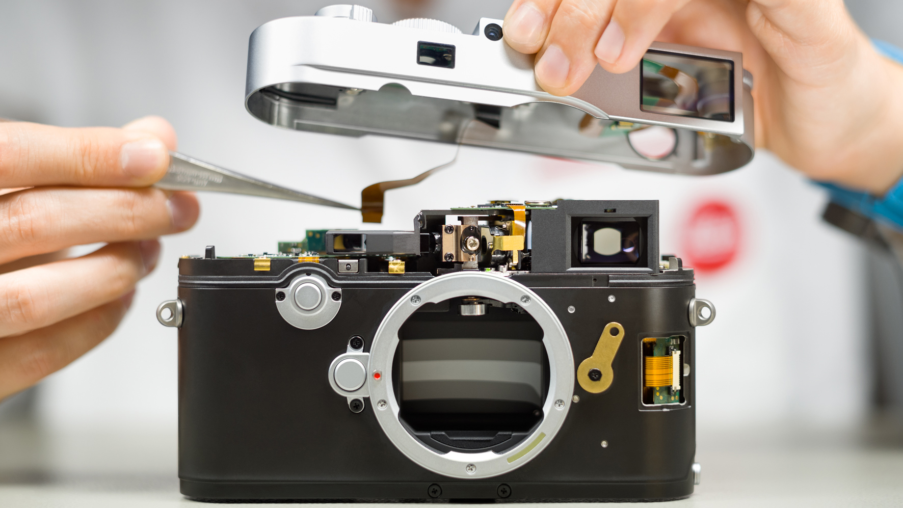 The Leica M11 being constructed with its top plate removed