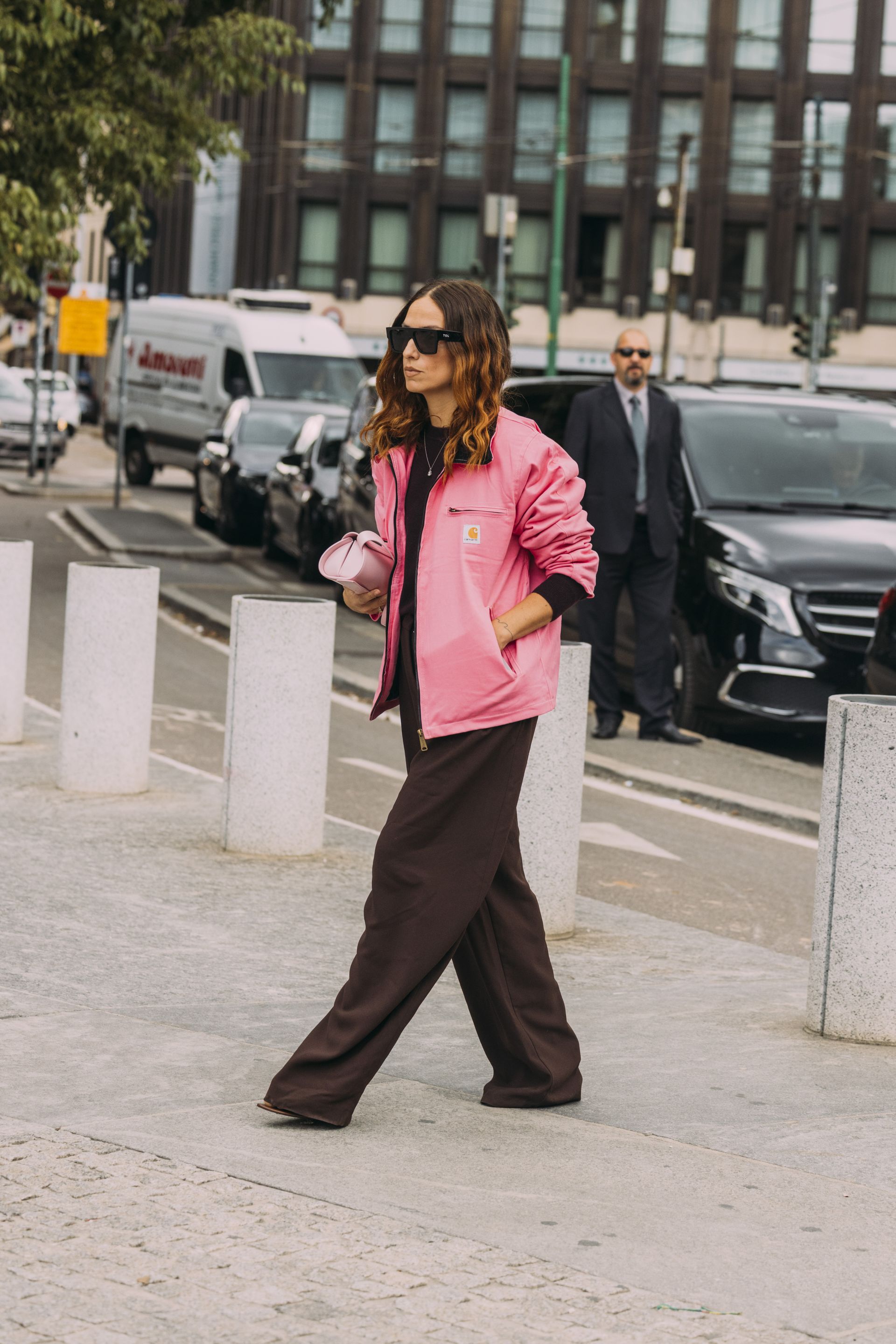 Women in milan wearing black pants outfits.