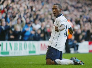 Jermain Defoe celebrates after scoring on his debut for Tottenham against Portsmouth in February 2004.